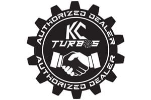 A black and white picture of kc turbo 's authorized dealer logo