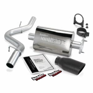 Exhaust system parts with stickers and instructions.