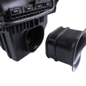 Black automotive air intake box and duct.