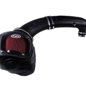 Black automotive air intake with red filter.