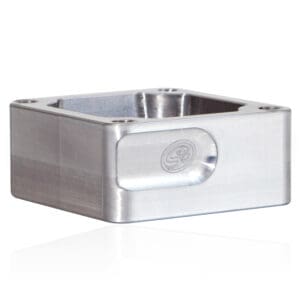 Metallic rectangular block with engraved logo.