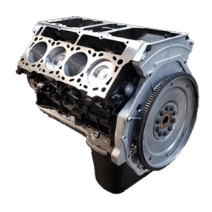 V8 engine block with flywheel attached.