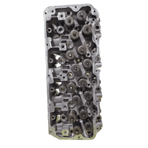 Engine cylinder head with valves and springs.