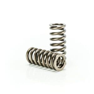 Metal compression springs on white background.