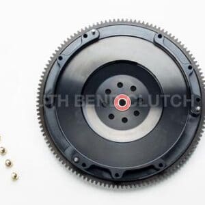 Clutch flywheel with ball bearings displayed.