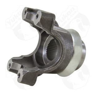 Metal automotive part with gear teeth.